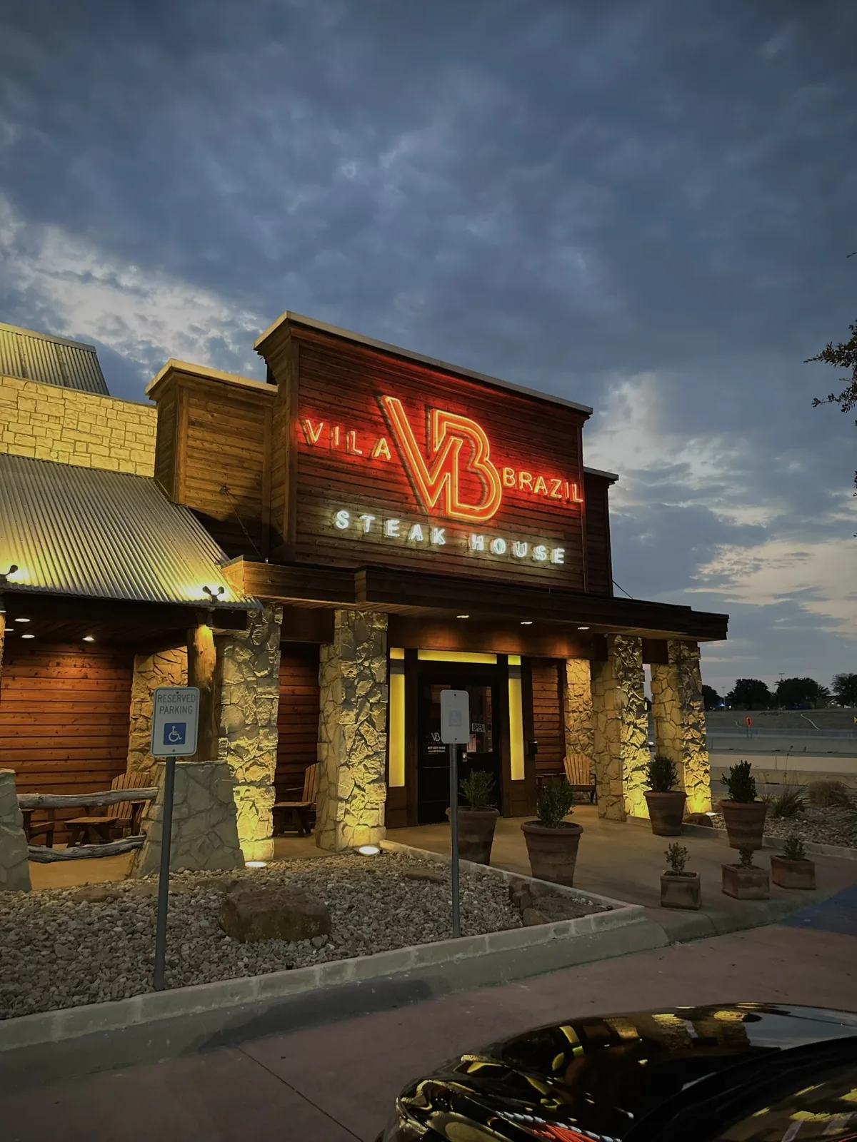 The illuminated VB Steakhouse entrance in Arlington, Texas